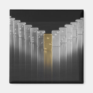 Guld- och silverdomino magnet