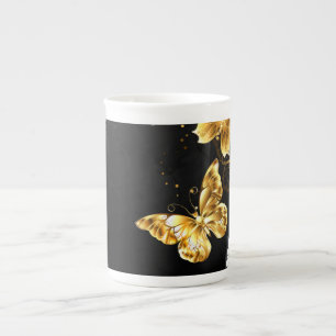 Guld och vita fjärilar benporslin mugg