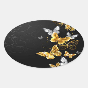 Guld och vita fjärilar ovalt klistermärke
