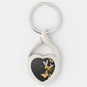 Guld och vita fjärilar twisted heart silverfärgad nyckelring
