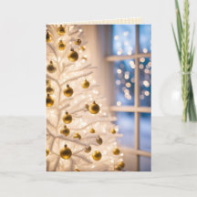 Guld på en vit Julgran