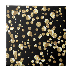 Guld polka dots mot svart bakgrund. kakelplatta