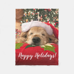 Guld- Retrieverhund för jul sovande under träd Fleecefilt