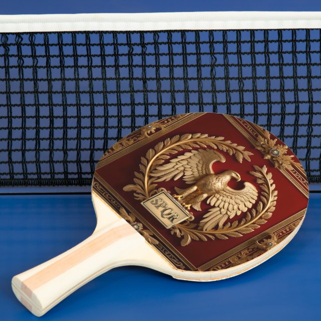 Guld romersk kejserlig eagle över rött nr 4 pingisracket (Insitu)