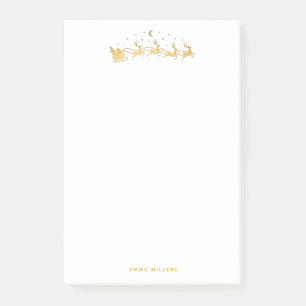 Guld Santa flyger i ett sleigh med renar Post-it Block