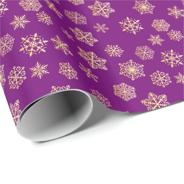 Guld- snöflingor på en purpurfärgad bakgrund presentpapper (Rullad Hörn)