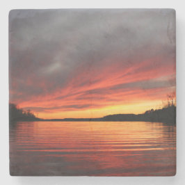 Guld- solnedgångmarmorkustfartyg stenunderlägg