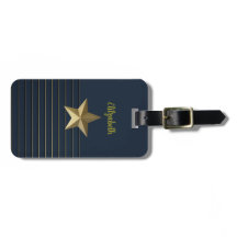 Guld Star på marinflaggat i marinblått bagage