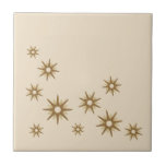Guld Starbursts i mitten av århundradet Kakelplatta<br><div class="desc">Modern design i mitten av århundradet som inspirerar till vintagen retro guld startar i en ekologisk design på en beige bakgrund. Enkel,  ren modern design.</div>