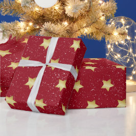 Guld stars med rött mot Snöflingor Presentpapper