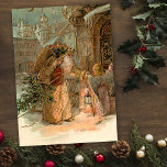 Guld Vintage Pappa jul och Angel Julkort<br><div class="desc">Pappa jul i den gamla världen med mycket utsmyckade guld är med gåvor och träd med vind ängel. Snygg kompletterande grafik på baksidan med redigerbar fält.</div>