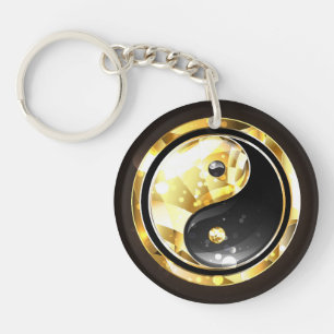 Guld Yin Yang på svart