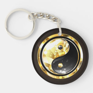 Guld Yin Yang på svart