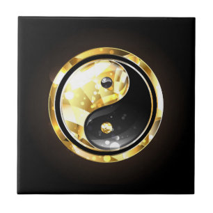Guld Yin Yang på svart Kakelplatta