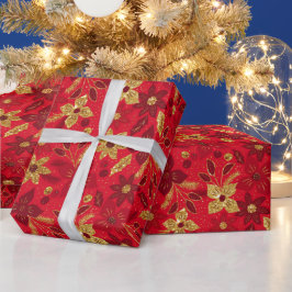 Gulda och röda julpoinsettia blommor presentpapper