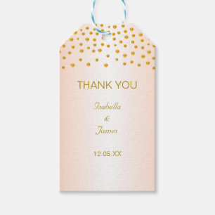 Guldconfetti på roséguld presentetikett