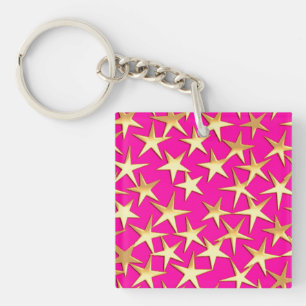 Guldfärgade stjärnor på fuchsia rosa