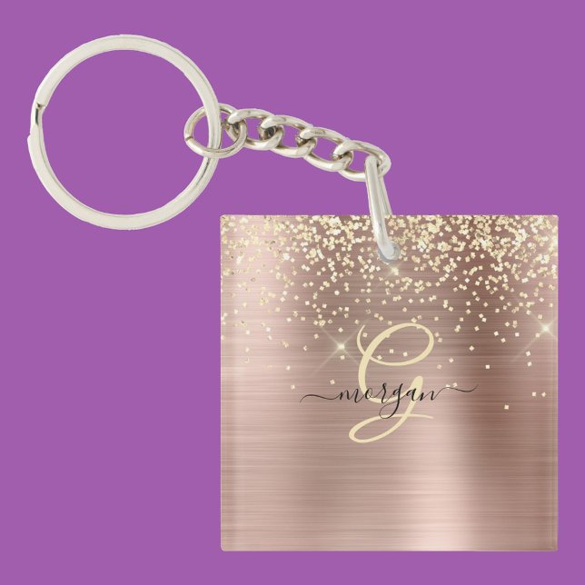 Guldglitter, guldmonogram, svart namn i skrivstil (Skapare uppladdad)