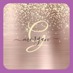 Guldglitter, guldmonogram, svart namn i skrivstil underlägg papper kvadrat