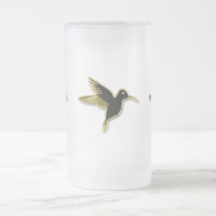 Guldkolibri med utsträckta vingar frostat ölglas