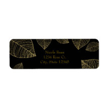 Guldlöv på svarta eleganta etiketter