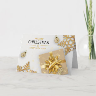 Guldpresentlåda julgranskulor guld snöflingor kort