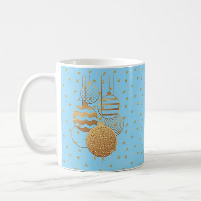 Guldpynt och stjärnor på en isblå bakgrund kaffemugg (Vänster)