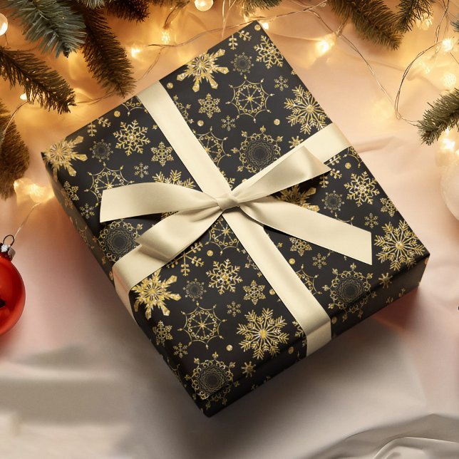 Guldsnöflingan på svart julafton presentpapper (Skapare uppladdad)