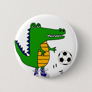 Gullig alligator som leker fotboll- eller knapp
