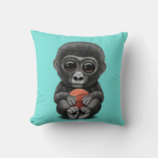 Gullig babygorilla som leker med basket kudde (Framsida)