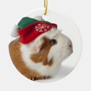 Gullig försökskanin med julhatten på vit julgransprydnad keramik