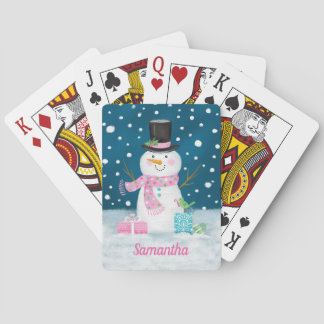 Gullig julhelgdagsnögubbe som leker kort casinokort