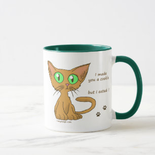 Gullig kattunge åt din kaka mugg
