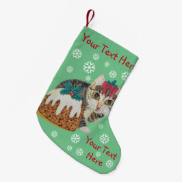 gullig kattungegråtttabby som slickar tassjul liten julstrumpa