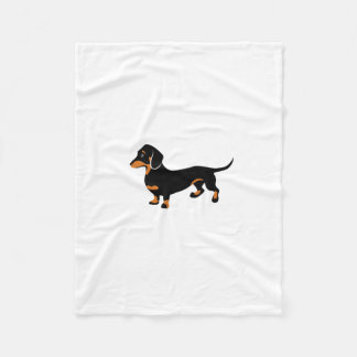 Gullig lite svart- och solbrännatax - Doxie hund Fleecefilt