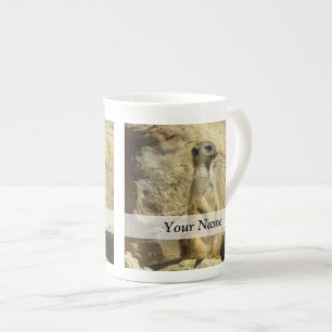 Gullig meerkat fotograferar benporslin mugg