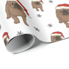 Gullig mopsjul som slår in papper presentpapper