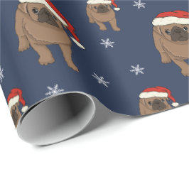 Gullig mopsjul som slår in papper presentpapper