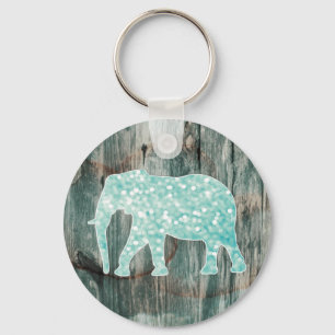 Gullig nyckfull elefant på den Wood designen Nyckelring
