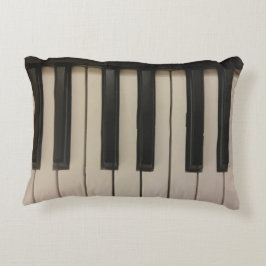 Gullig pianonyckeldesign prydnadskudde