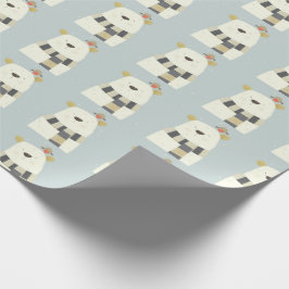 Gullig polar björn som slår in papper presentpapper