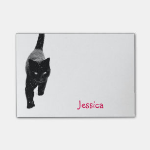 Gullig svart katt i det snö personifierade post-it block