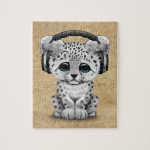 Gullig unge Dj som för snöleopard ha på sig Pussel