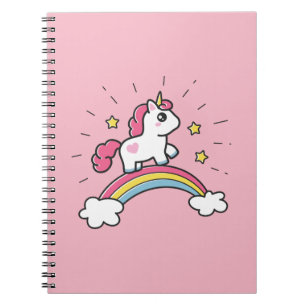 Gullig Unicorn på en regnbågedesign Anteckningsbok