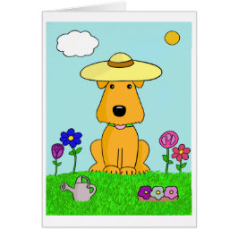 Gullig valphund i det trädgårds- kortet hälsningskort