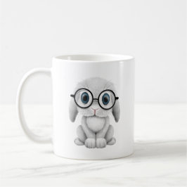 Gullig vitbabykanin som ha på sig exponeringsglas kaffemugg