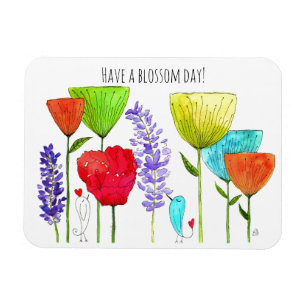 Gulliga och färgrika blommor och en fågelmagnet magnet