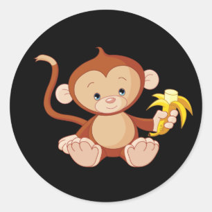 gulligt animera apan med bananen runt klistermärke