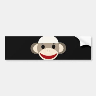 Gulligt le sock monkeyansikte på röd svart bildekal