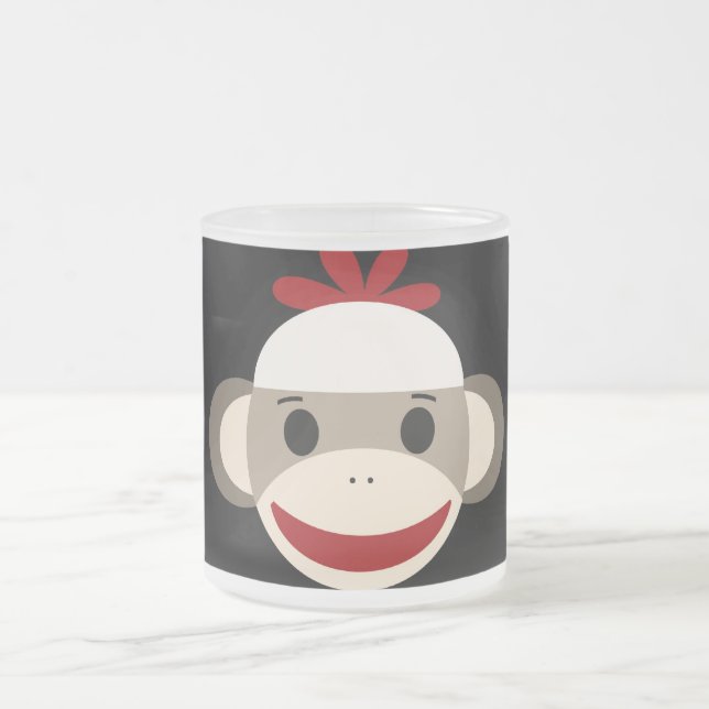 Gulligt le sock monkeyansikte på röd svart frostad glasmugg (Center)